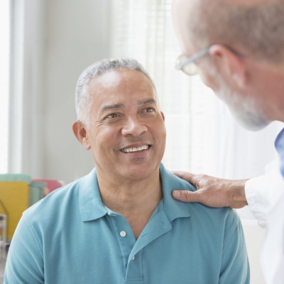 A salivary cancer specialist and patient discuss treatment options at Florida Hospital Cancer Institute