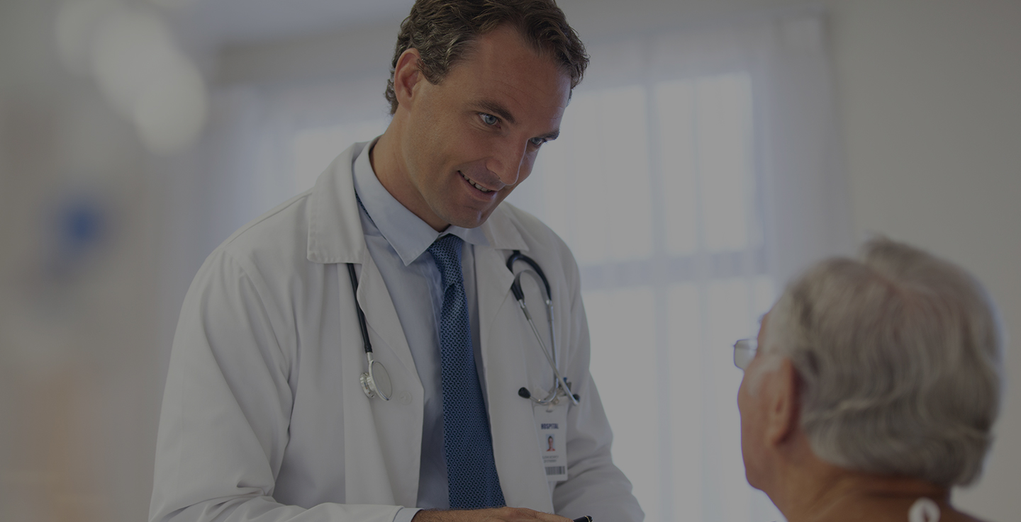 One of AdventHealth Cancer Institute's nationally accredited, award-winning cancer care specialists speaks with a patient