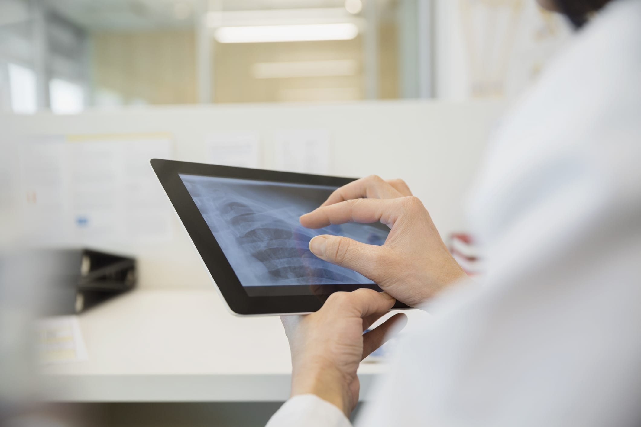 A cancer treatment patient discusses AdventHealth Cancer Institute's cutting edge radiation therapy options with a nurse navigator