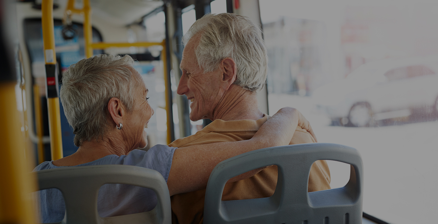 An older couple ride the bus to one of AdventHealth Cancer Institute's seven cancer care facilities in Central Florida