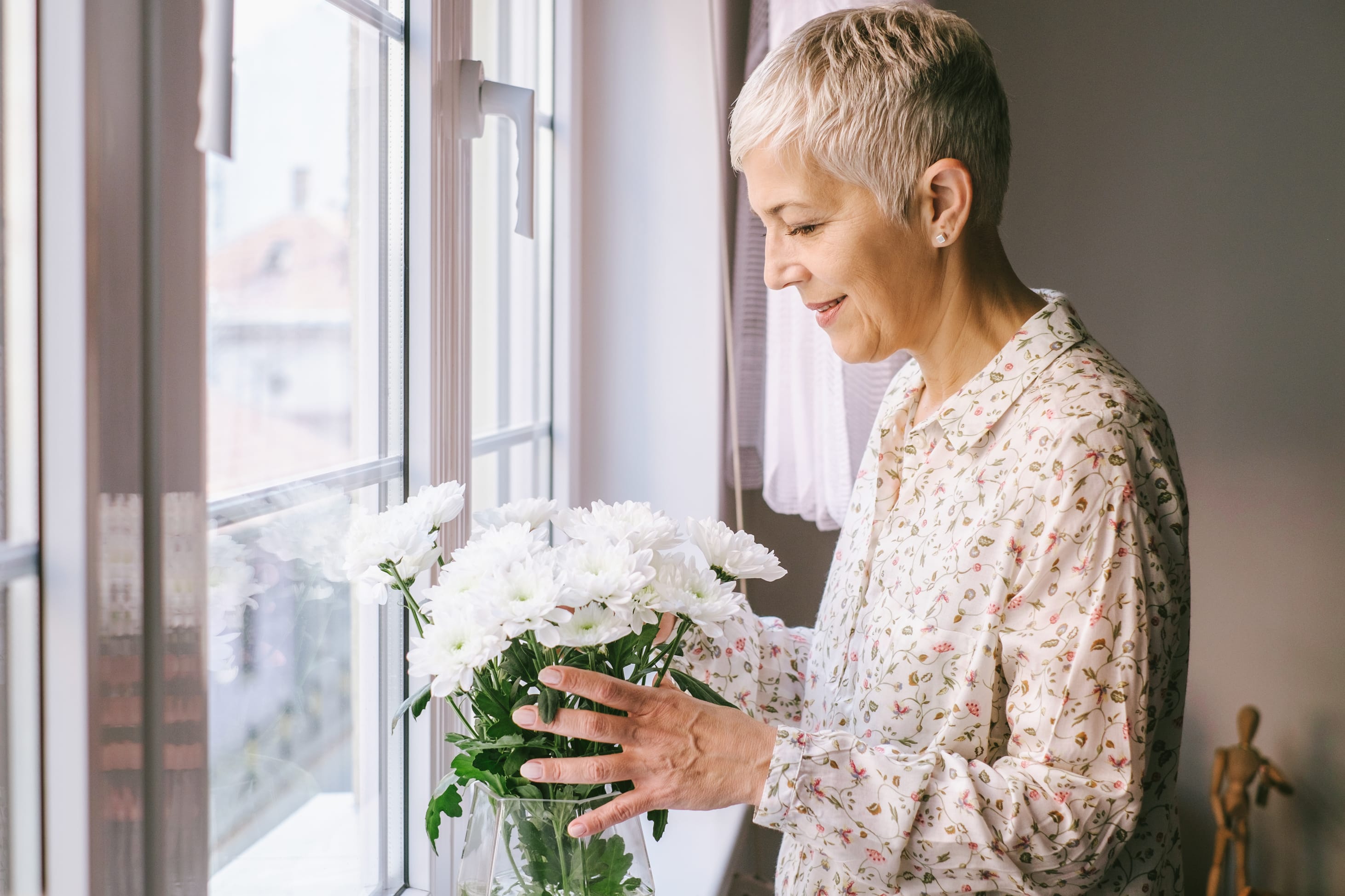 elderly woman with flowers