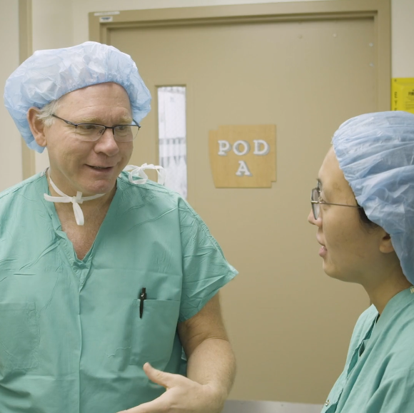 Dr. Holloway speaks with Dr. Chu